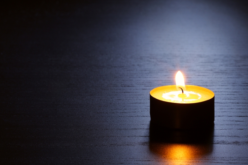 Single Candle With Back Lit. Tranquil Scene